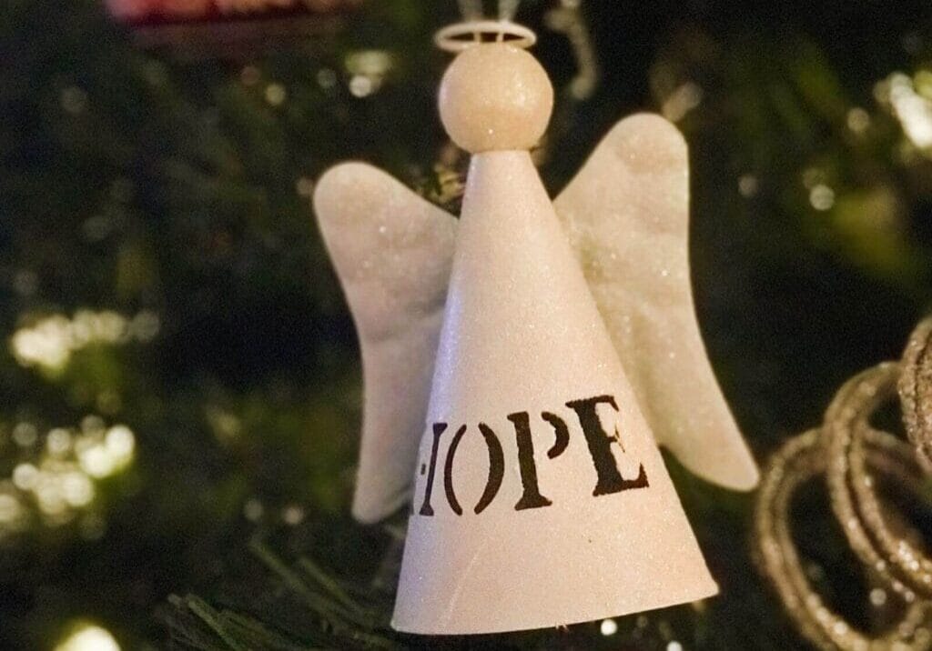 Christmas tree ornament that says "hope"